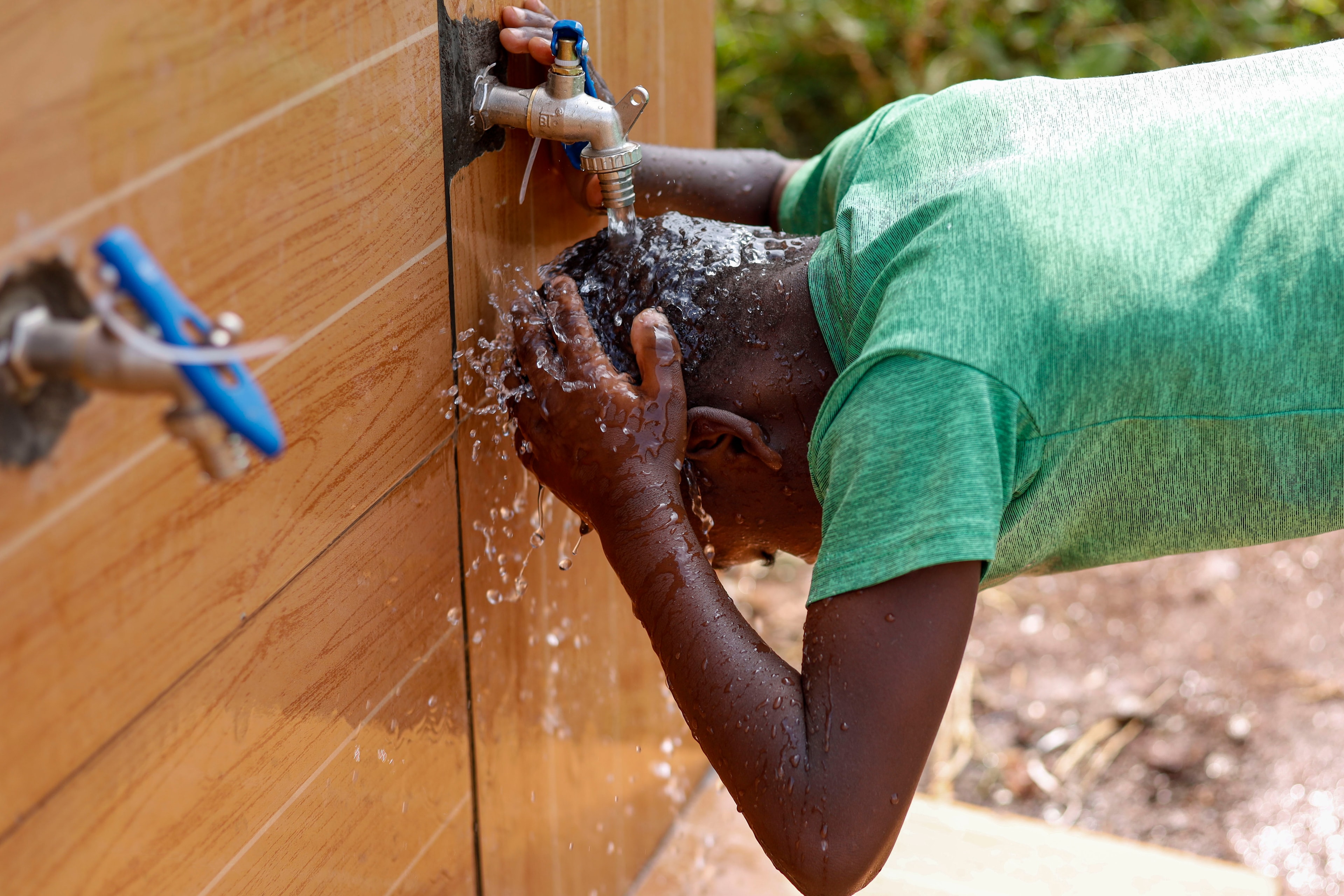 Hands-on work during the Buwambo well build