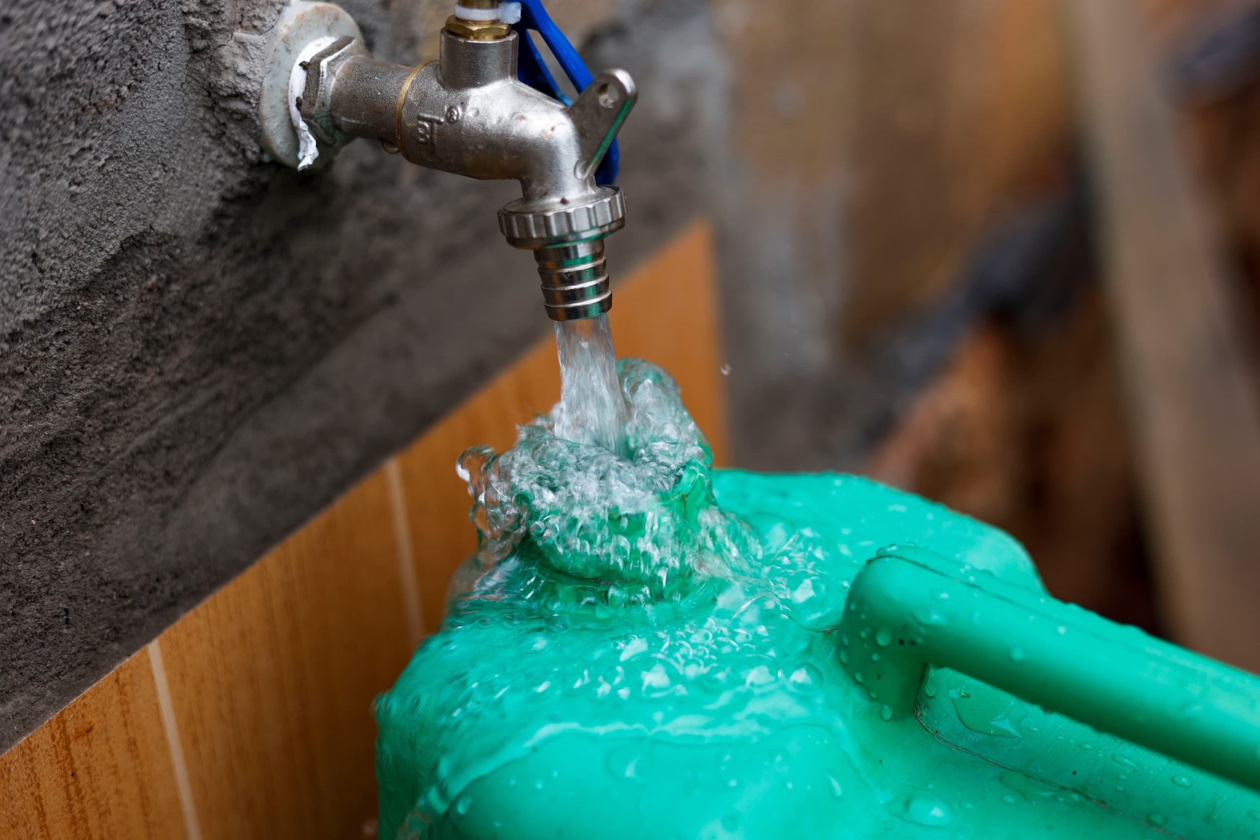 Water flowing from the Buwambo faucet